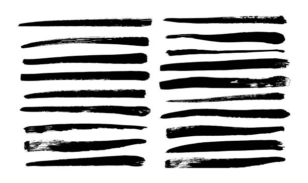 istock Collection of long black brush strokes drawn by hand. Vector illustration 1297140435