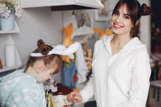 istock Mother with little daughter in a kitchen 1297146812