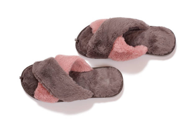 istock Soft slippers isolated on white background. Top view 1297147294
