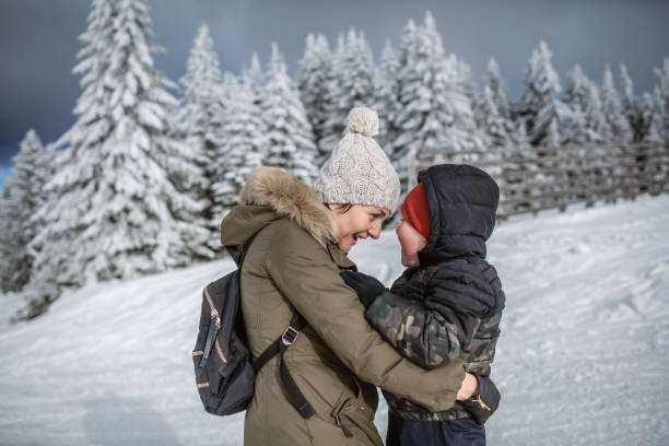 istock Mother and son enjoying in a winter day 1297148848