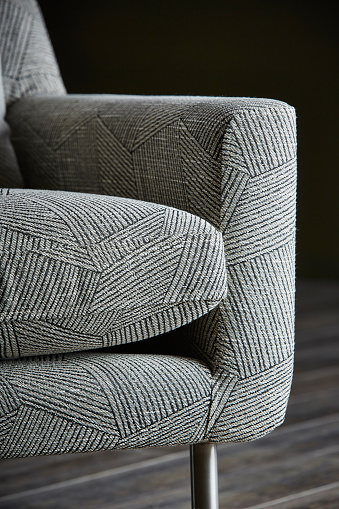 Close-up of a comfortable sofa with striped pattern fabric in living0 room