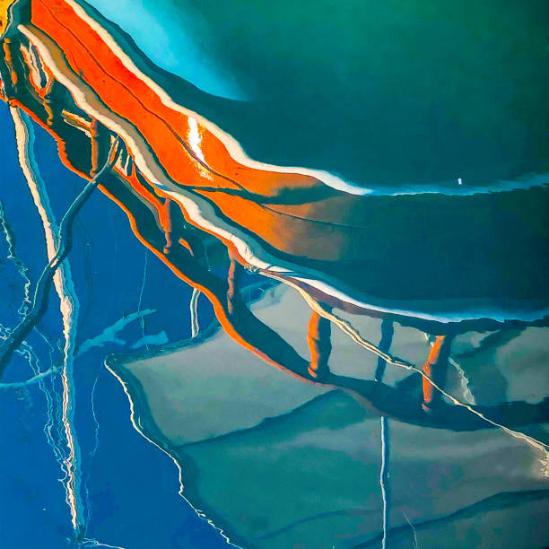 Reflection of wooden yacht