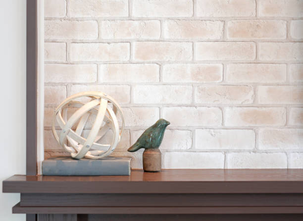 istock Decorative on table in modern living room against interior design brick wall background 1297153544