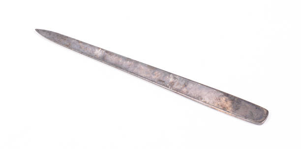 istock Old letter opener isolated on a white background 1297153638