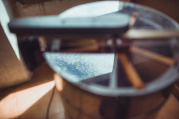 istock Honey extraction: the sky reflected in the extractor cover 1297163289