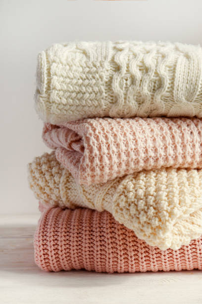 istock Warm knitted clothing items. 1297168293