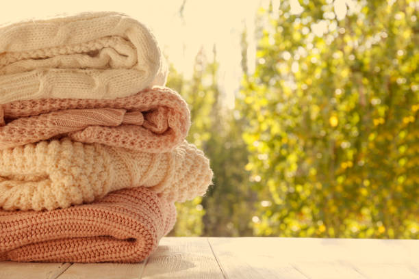 istock Warm knitted clothing items. 1297168328