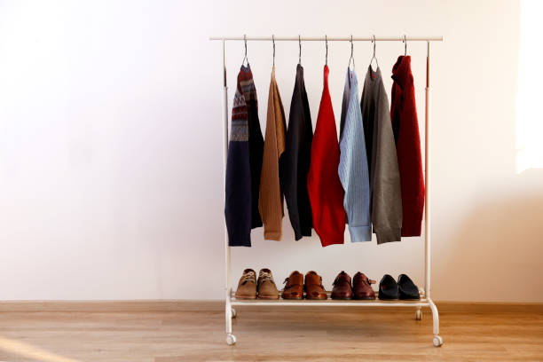 istock Warm clothing items on the rack. 1297168482