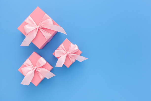 istock Valentines day composition: pink gift boxes with ribbon 1297169747