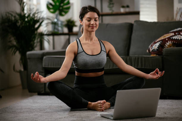 istock Fit woman training at home. 1297173174