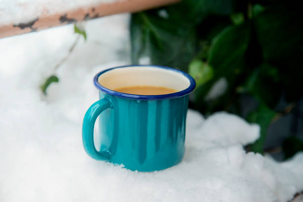 istock Morning coffee with the first snow 1297176605