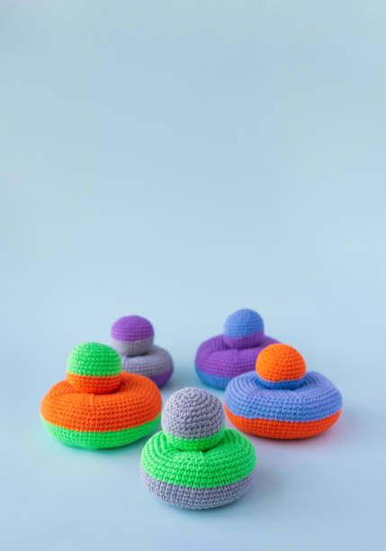 istock Children's educational game, knitted toys, children's hand motor development. 1297177583