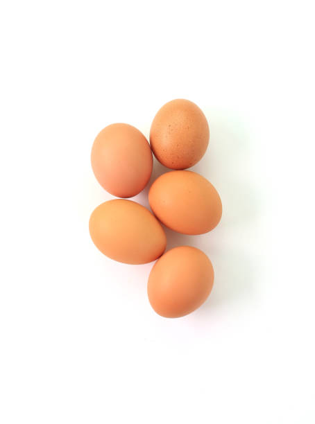 istock Chicken brown eggs isolated on white background. Top view 1297177841