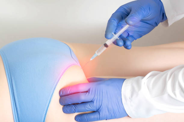 the-doctor-makes-the-patient-a-medication-blockade-in-the-area-of-the-sciatic-nerve-buttocks.jpg?s=612x612&w=0&k=20&c=Ffz3hKFRGkDM2BrZCTVxPZnbuUUbLj5AHnM4rLrMgHw=