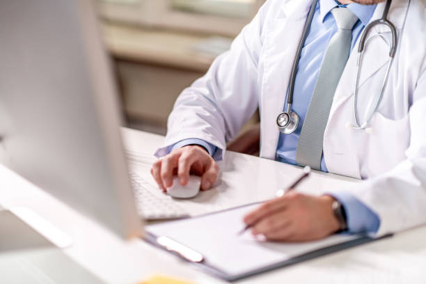 istock Close up of doctor working in his office 1297179680