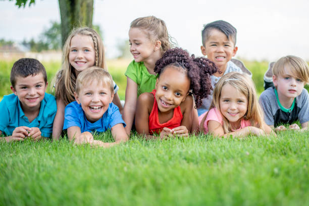 istock Kindergarteners outside in the summertime 1297182527
