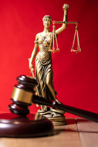 istock lady justice with judge gavel in front 1297182584