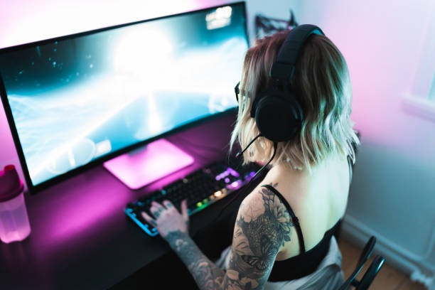 istock Gamer playing computer games at home 1297183041