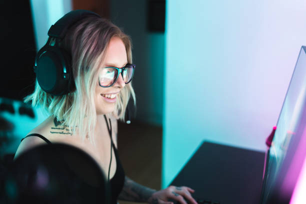 istock Gamer playing computer games at home 1297183063