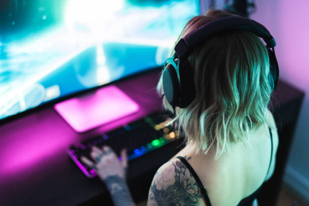 istock Gamer playing computer games at home 1297183071