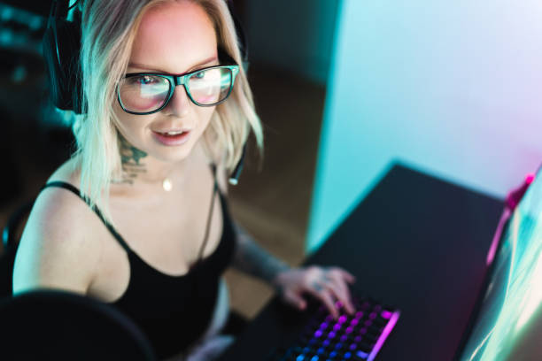 istock Gamer playing computer games at home 1297183095