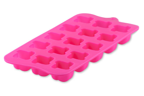 istock Pink silicone form isolated on white background. Cake cup, silicone mold, bakeware. 1297183502