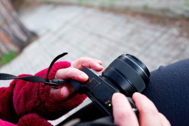istock Tourist hold digital camera (mirrorless camera) ready for take a photo 1297184670