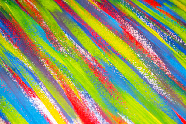 istock Background from different strokes of red, yellow, green and blue paint 1297185183