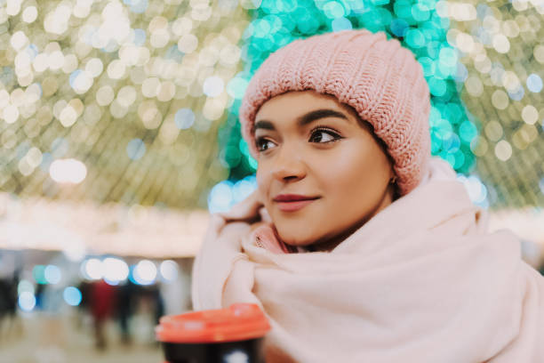 istock Young woman celebrating winter holidays 1297185313