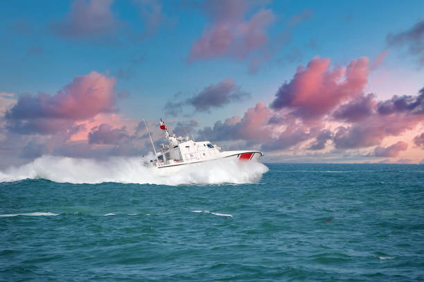 istock coast guard boat and cloudy sky 1297186067