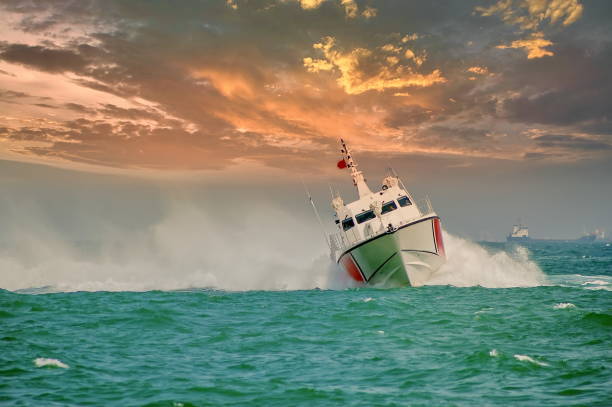 istock coast guard boat and cloudy sky 1297186068