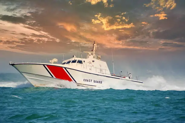 Photo of coast guard boat and cloudy sky