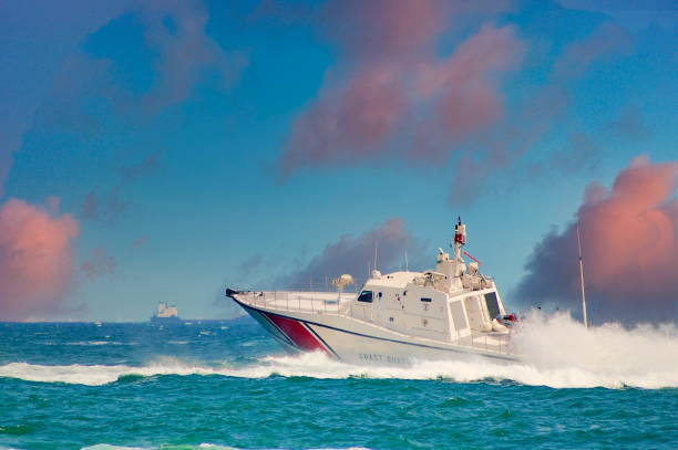 istock coast guard boat and cloudy sky 1297186072
