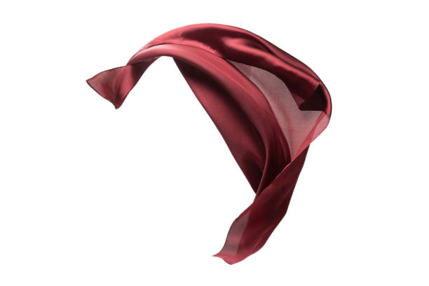 istock Flowing red silk scarf isolated on white background. 1297186204