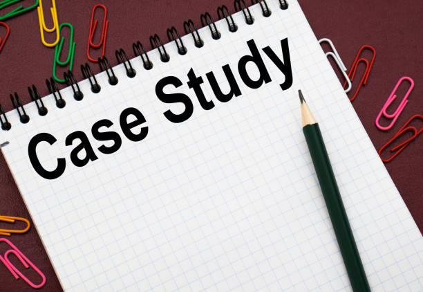 istock Design concept - Top view of white spiral notebook and pencil with text CASE STUDY isolated on red background for mockup 1297188142
