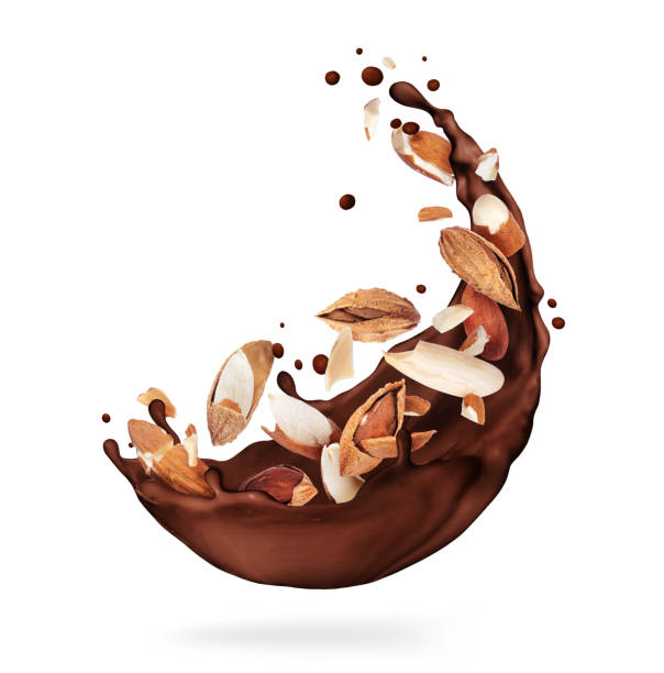 istock Chocolate splashes with crushed almonds close-up on a white background 1297188367