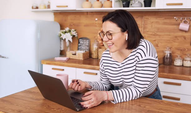 istock Video call tutoring. Student freelancer wear headphone study online with teacher. 1297190514