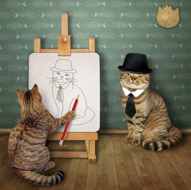 istock Cat artist paints his friend 2 1297191333