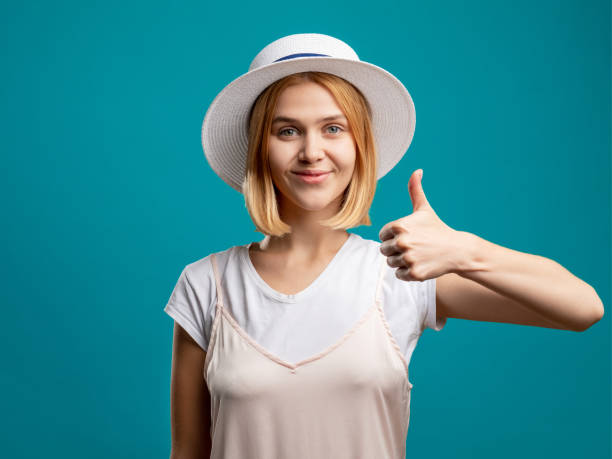 istock like gesture approval sign happy woman thumb up 1297191694