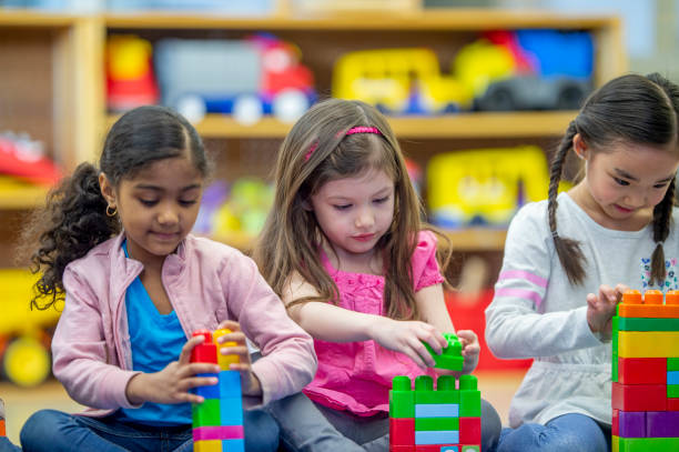 istock Teamwork to build the tallest tower 1297192992