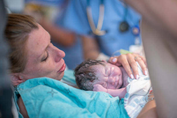 istock A new mother holding her baby for the first time 1297193122