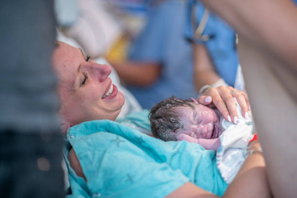 istock A new mother holding her baby for the first time 1297193130