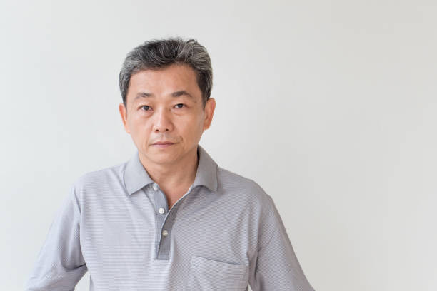 istock portrait of middle age, old, senior man looking 1297193374