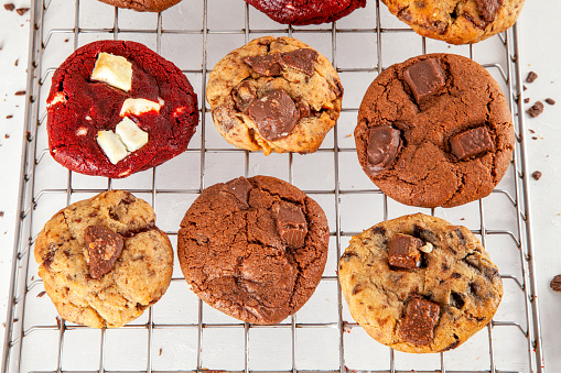 Batch of freshly baked cookies in a variety of flavours