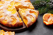 Citrus dessert holiday cake with tangerines