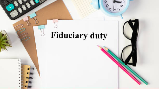 istock Paper with Fiduciary duty on a table 1297194221