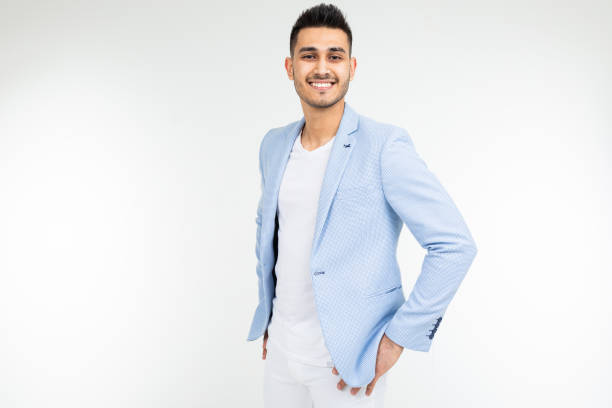 istock successful businessman in a blue jacket posing on a white background with copy space 1297198698