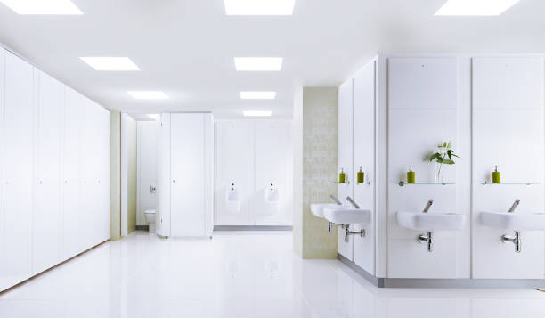 public restroom interior - urinal clean contemporary in a row imagens e fotografias de stock