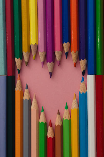 Wooden crayons make a heart shape. Creative idea.