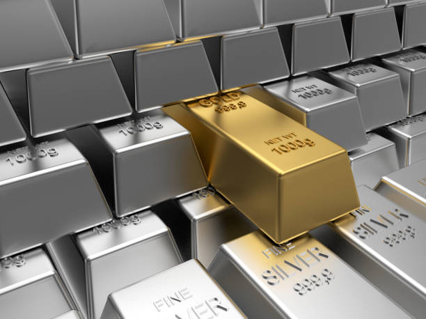 istock Rows of silver bars with one gold bar 1297203847